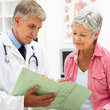 A medical professional discussing a patients test results. Links to Donor-Advised Funds A medical professional discussing a patients test results. Links to Donor-Advised Funds
