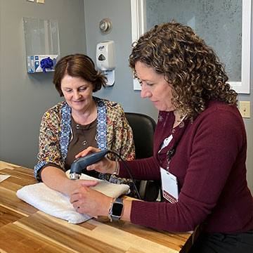 A medical professional using a device on a patient. Links to Gifts from Retirement Plans A medical professional using a device on a patient. Links to Gifts from Retirement Plans